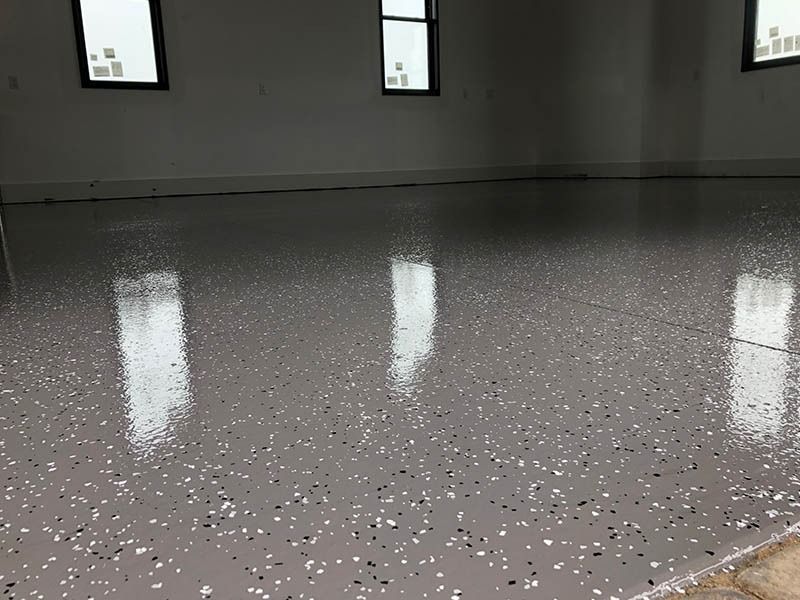 A garage floor with a lot of sparkles on it.