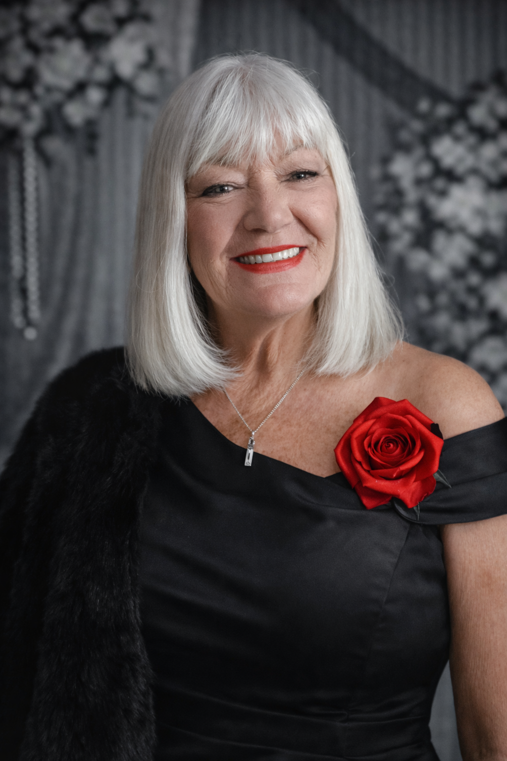 A painting of a smiling woman with long blonde hair