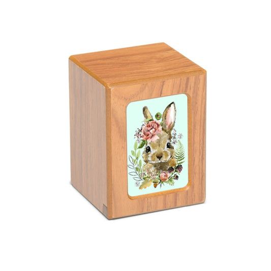 A wooden box with a picture of a rabbit on it.