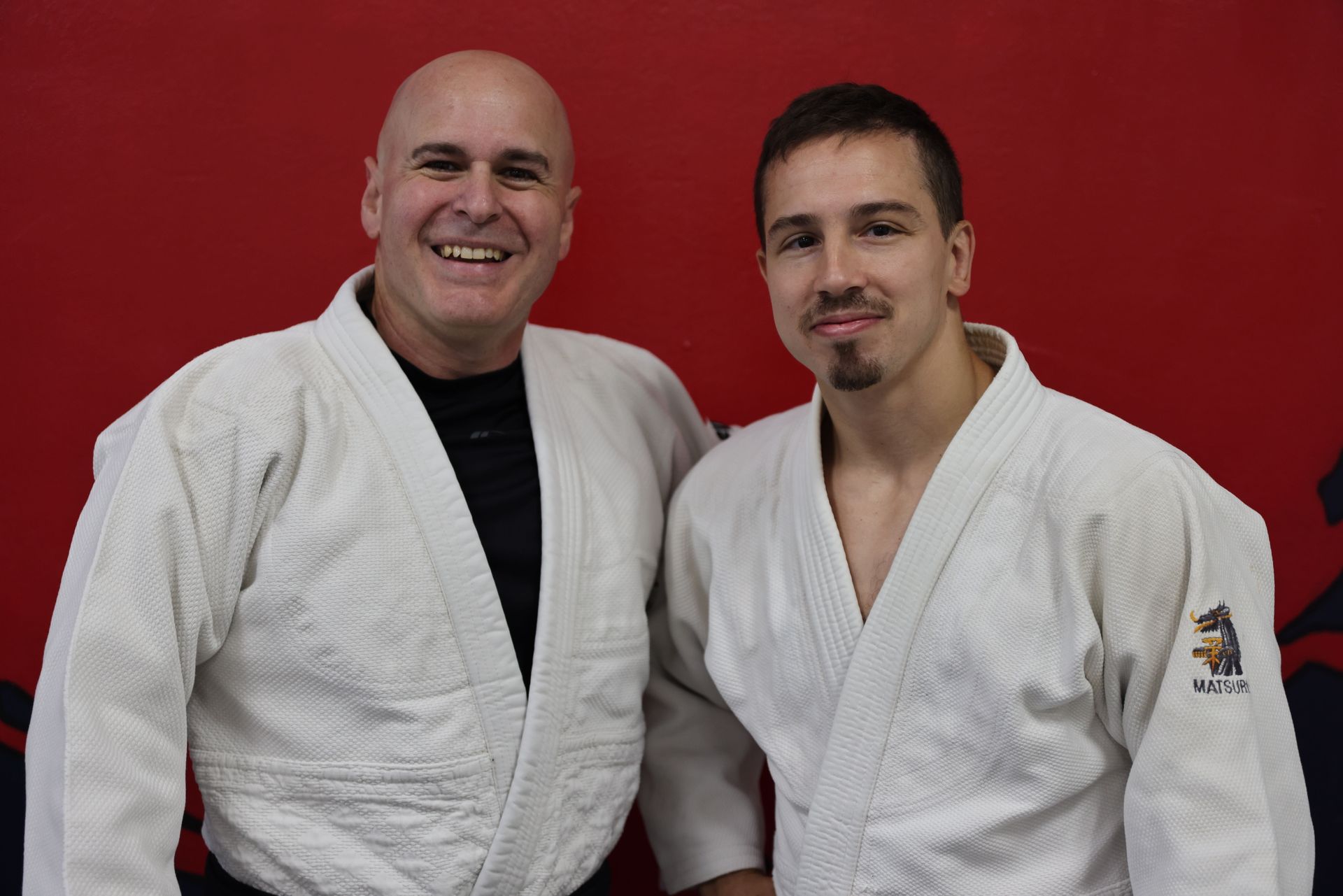 Students practice Judo throws and safe falls at Champion Martial Arts & Fitness in Pasadena, TX to build confidence.