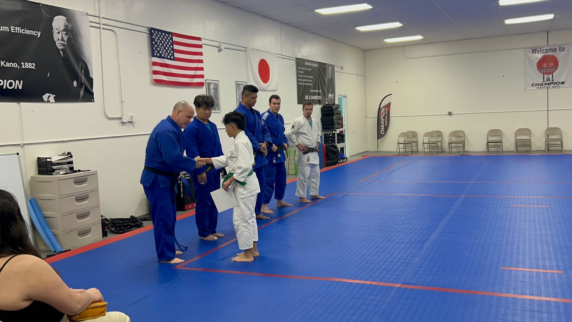 Partners practice Judo throws at Champion Martial Arts & Fitness in Pasadena, TX to build coordination and agility.
