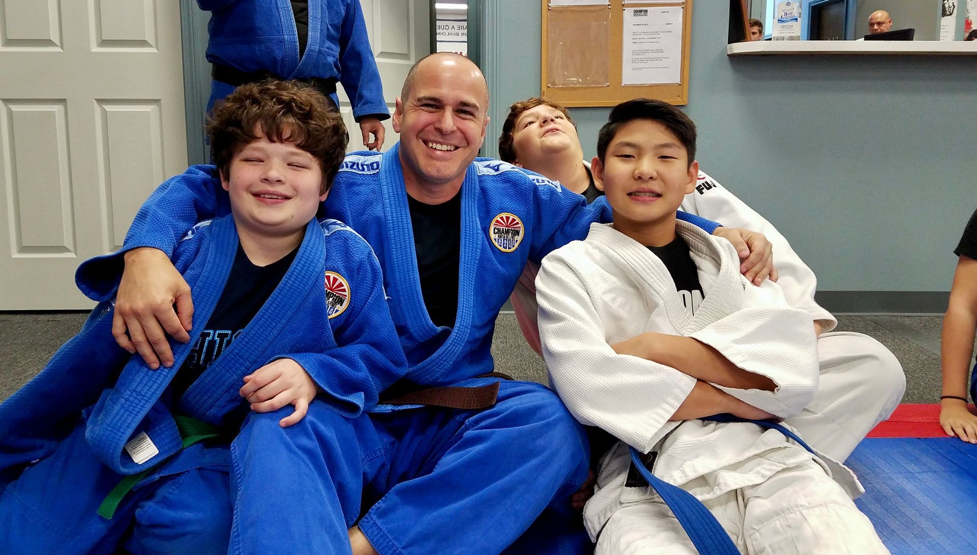 Students practice Judo throws at Champion Martial Arts & Fitness in Pasadena, TX, building confidence and fitness.