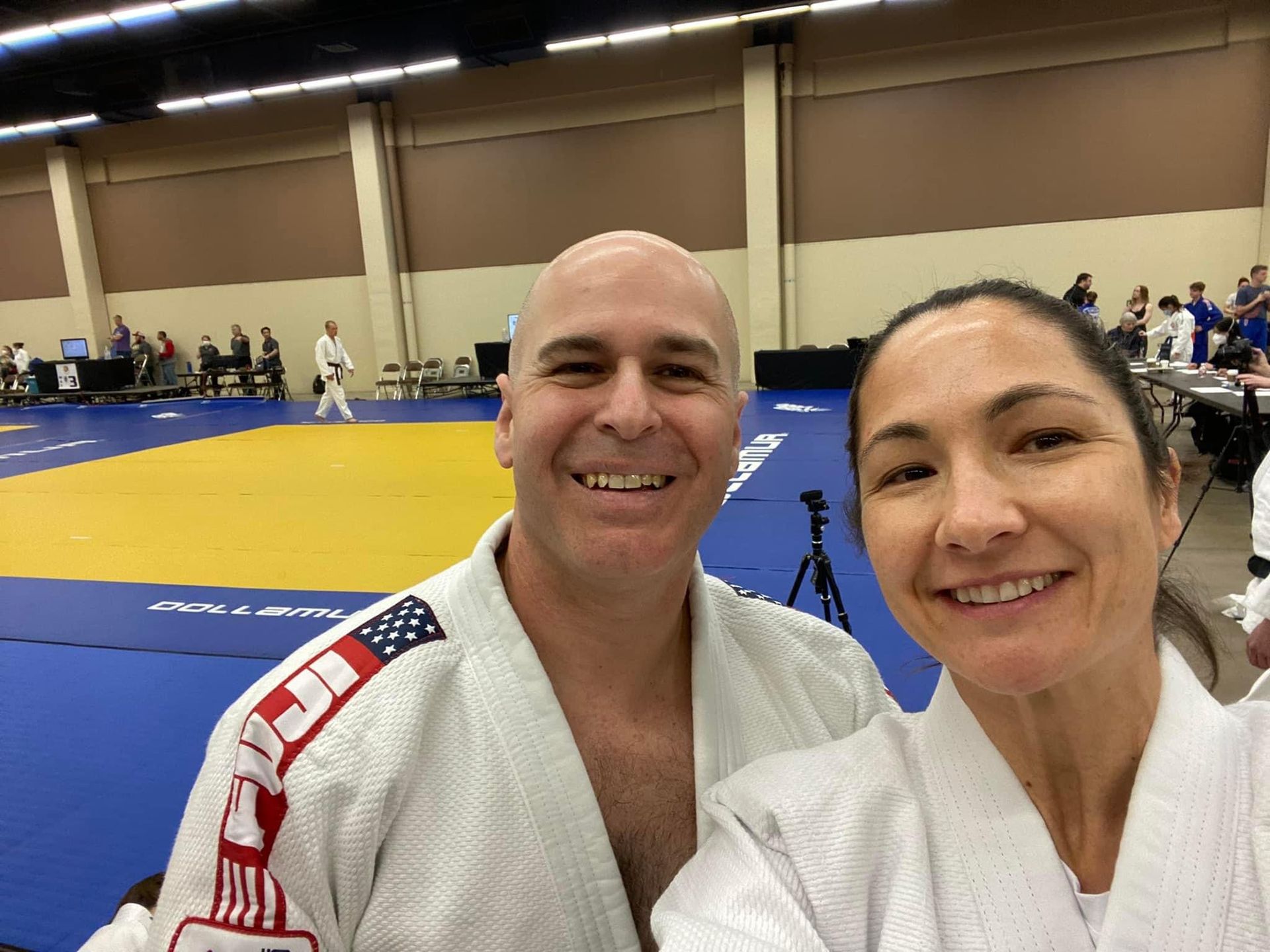 Judo students practicing controlled throws at Champion Martial Arts & Fitness in Pasadena, TX.