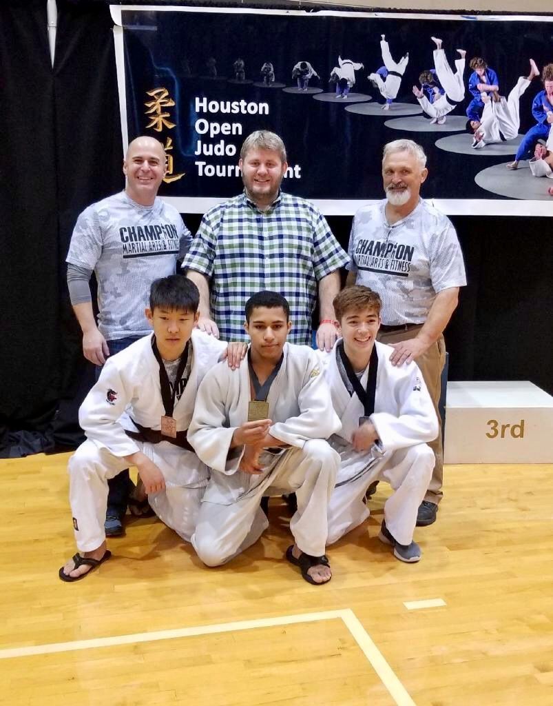 Students practice Judo grips and balance at Champion Martial Arts & Fitness in Pasadena, TX to build focus.