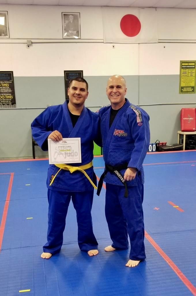 Kids practicing Judo throws with coaches at Champion Martial Arts & Fitness in Pasadena, TX to build confidence.
