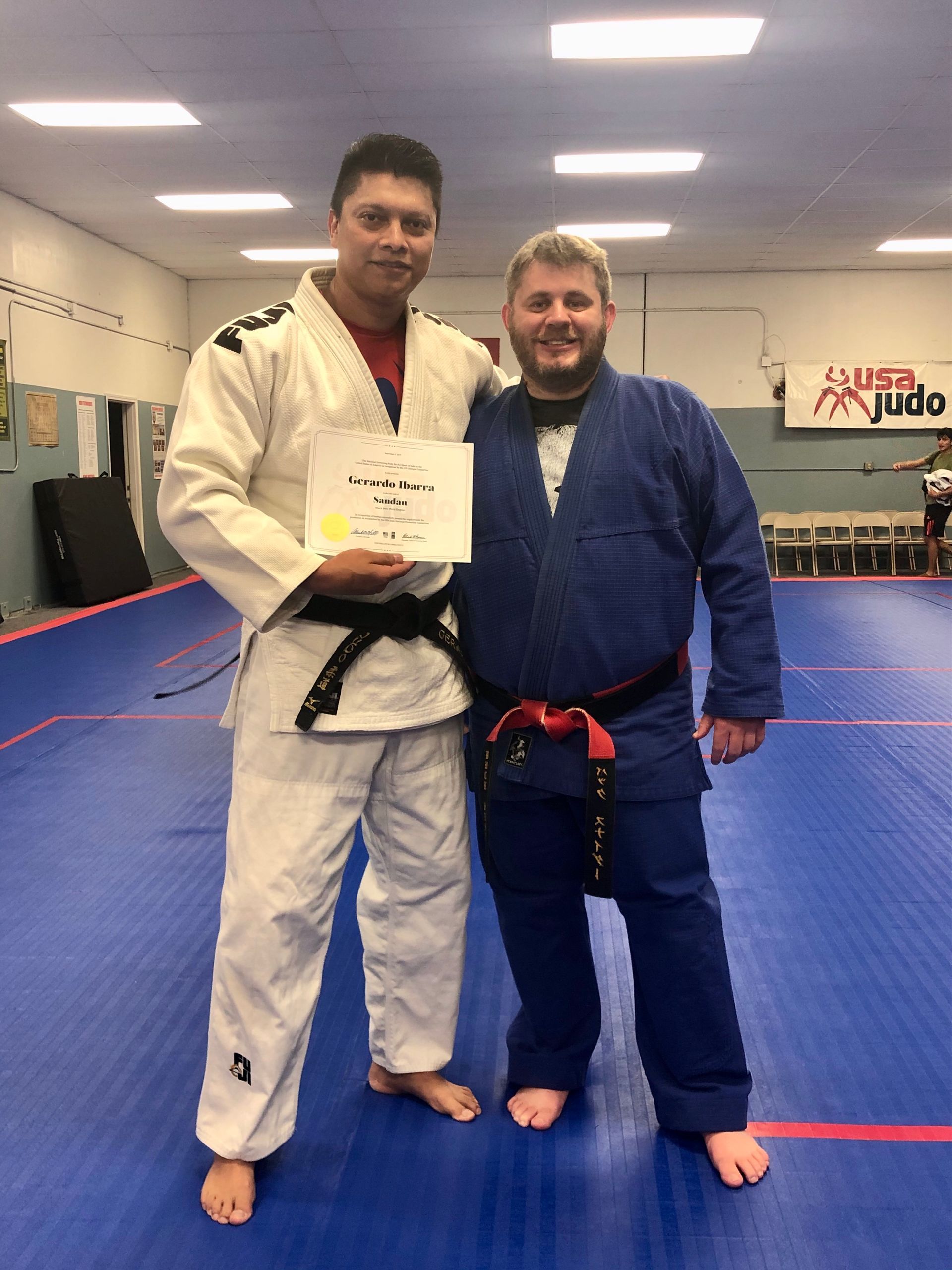 Adult students practicing Judo throws at Champion Martial Arts & Fitness in Pasadena, TX.
