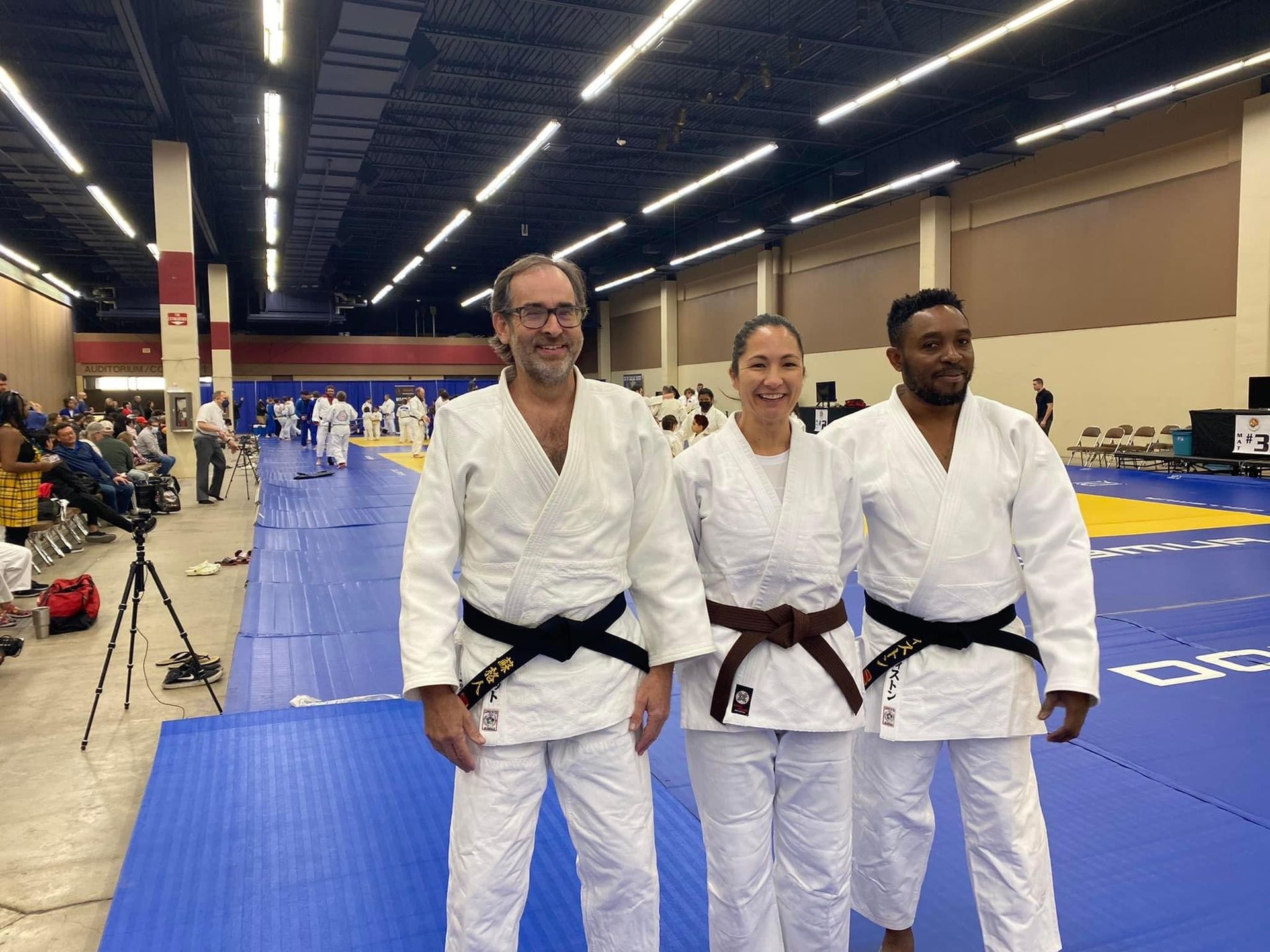 Training partners practice safe throws and breakfalls at Champion Martial Arts & Fitness in Pasadena, TX for confidence.