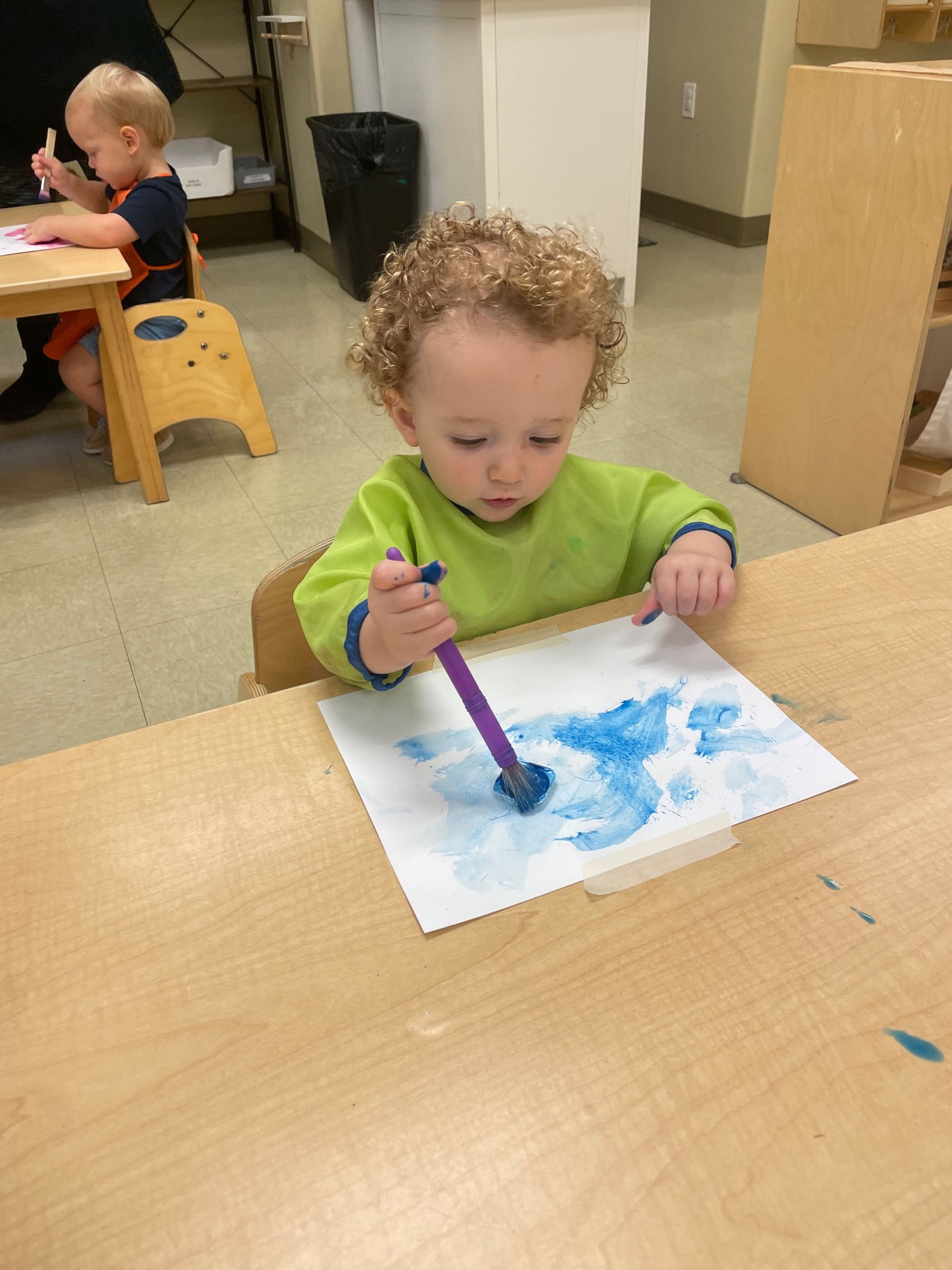 montessori child painting activity