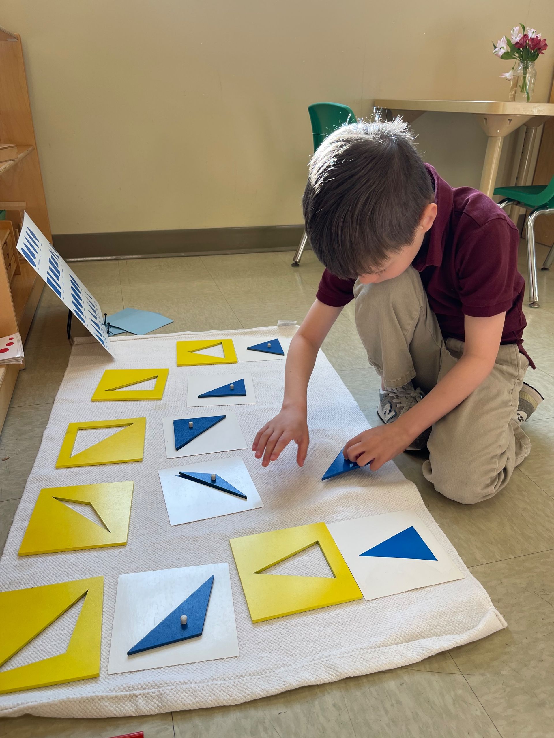 montessori child working with math activity