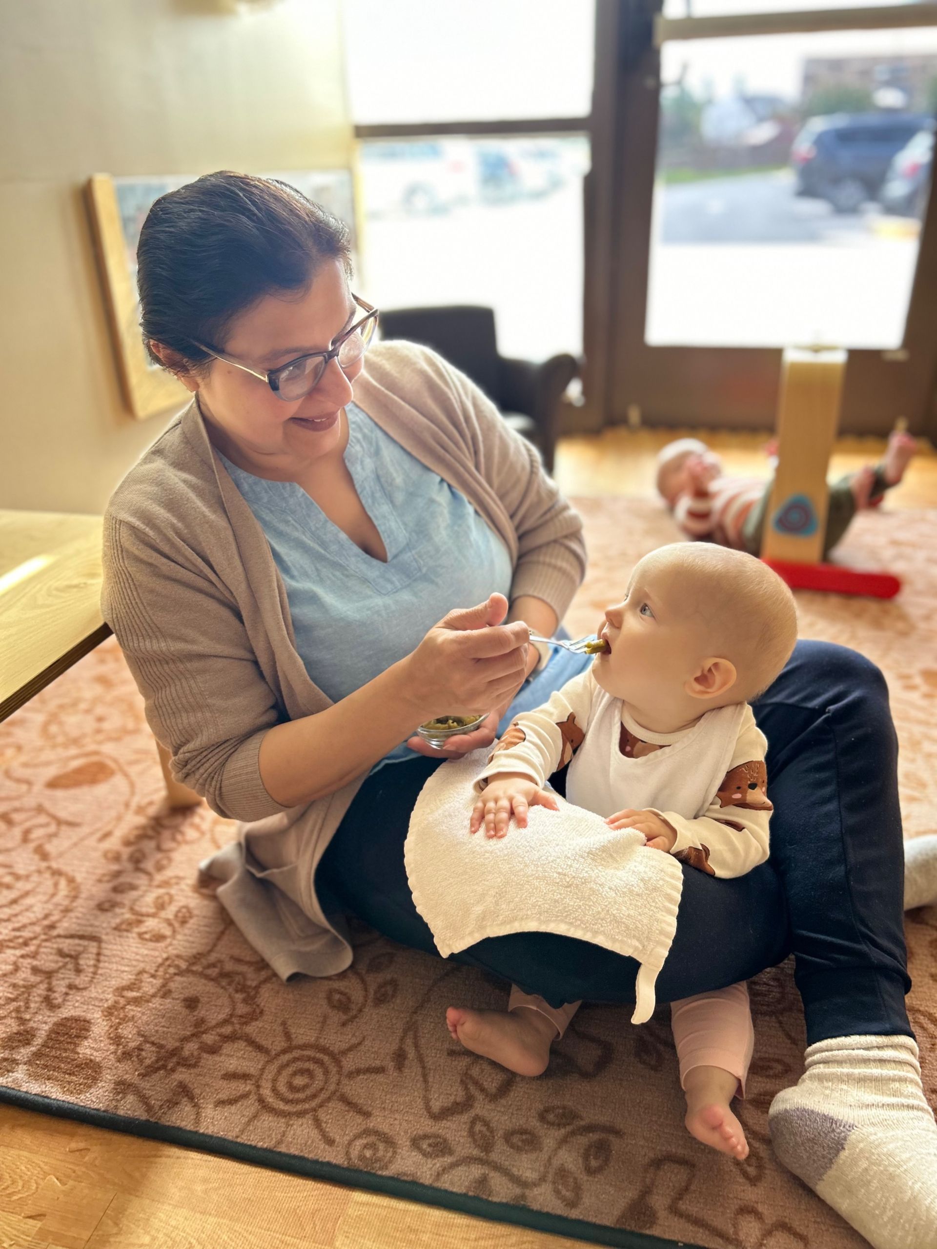 montessori infant with guide