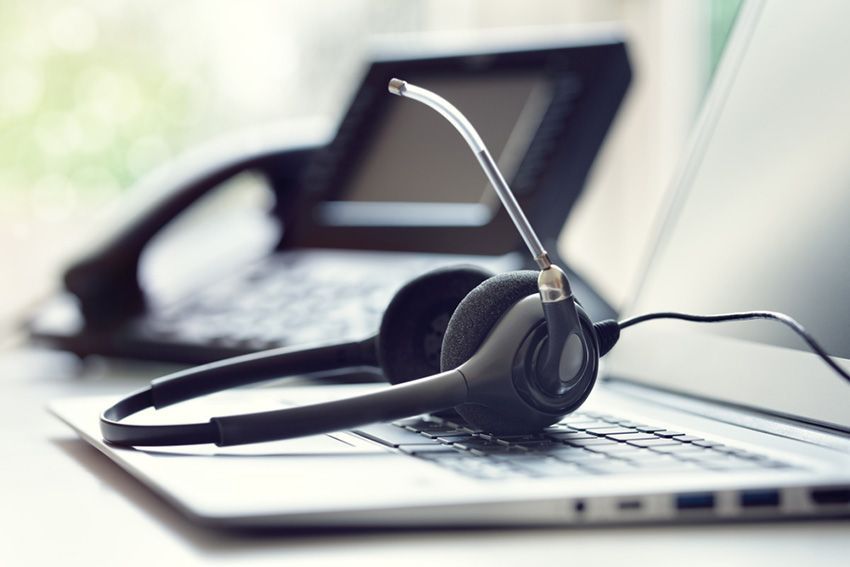 A Headset is on Top of a Laptop Computer — Ardent Office Equipment in Hermit Park, QLD