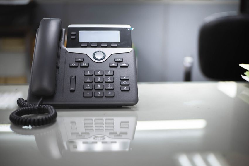 A Black Telephone on a White Table — Ardent Office Equipment in Hermit Park, QLD
