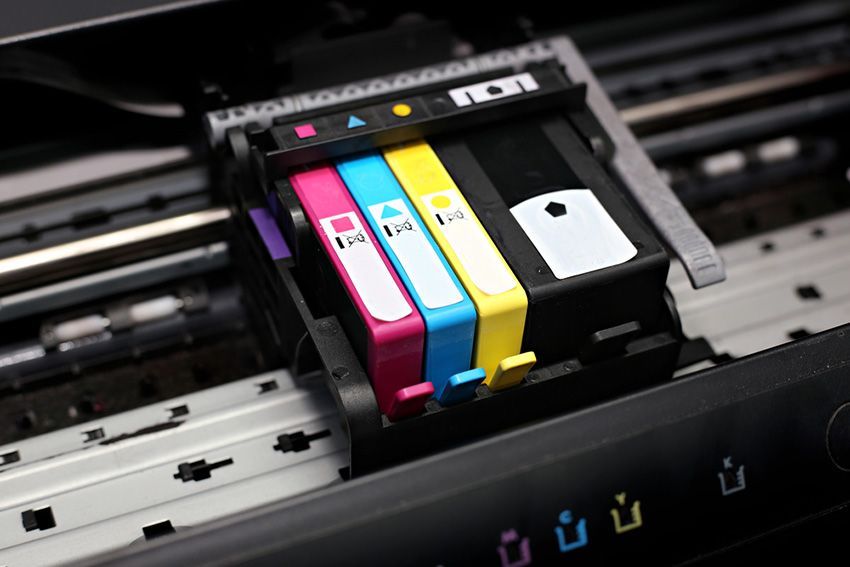 A Close Up of Three Ink Cartridges in a Printer — Ardent Office Equipment in Ayr, QLD