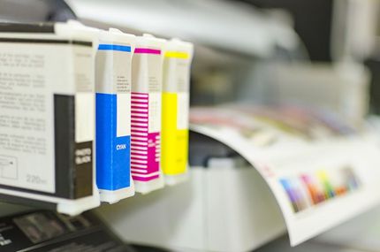 A Row of Colorful Ink Cartridges on Top of a Printer — Ardent Office Equipment in Hermit Park, QLD