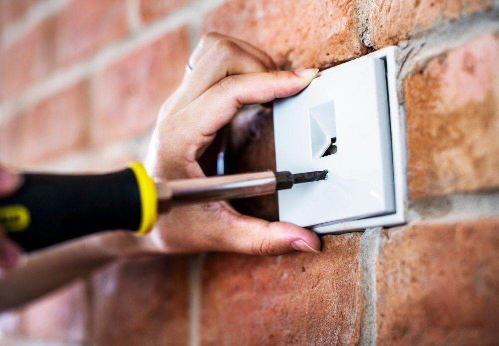 Fixing Light Switch — Premium Electrical Solutions in Bundaberg, QLD