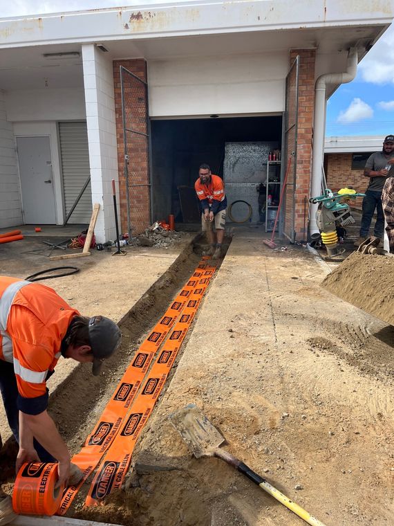 Electrician Working Near The Board With Wires. Installation And Connection Of Electrics — Premium Electrical Solutions in Bundaberg, QLD