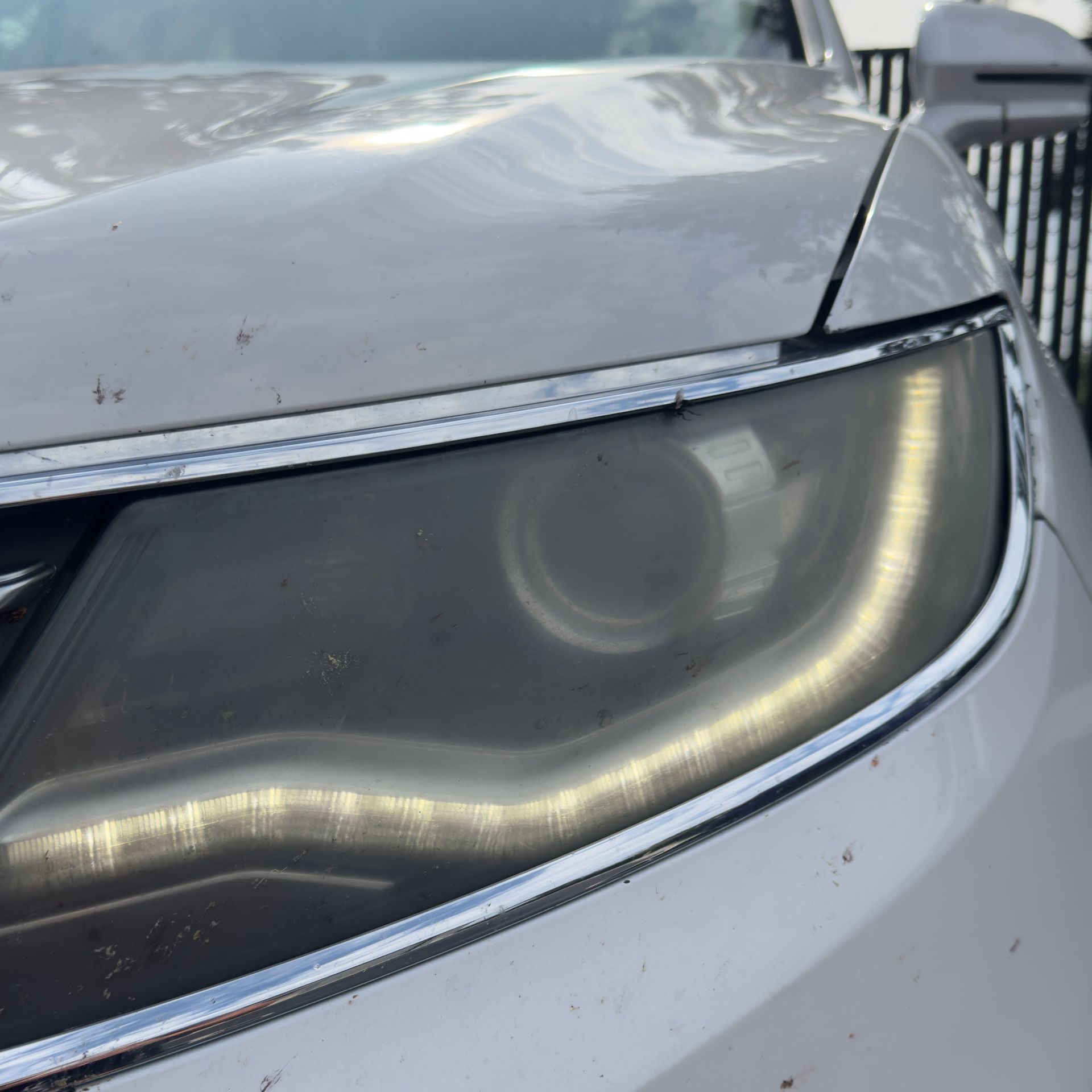 The engine of a car with the hood open