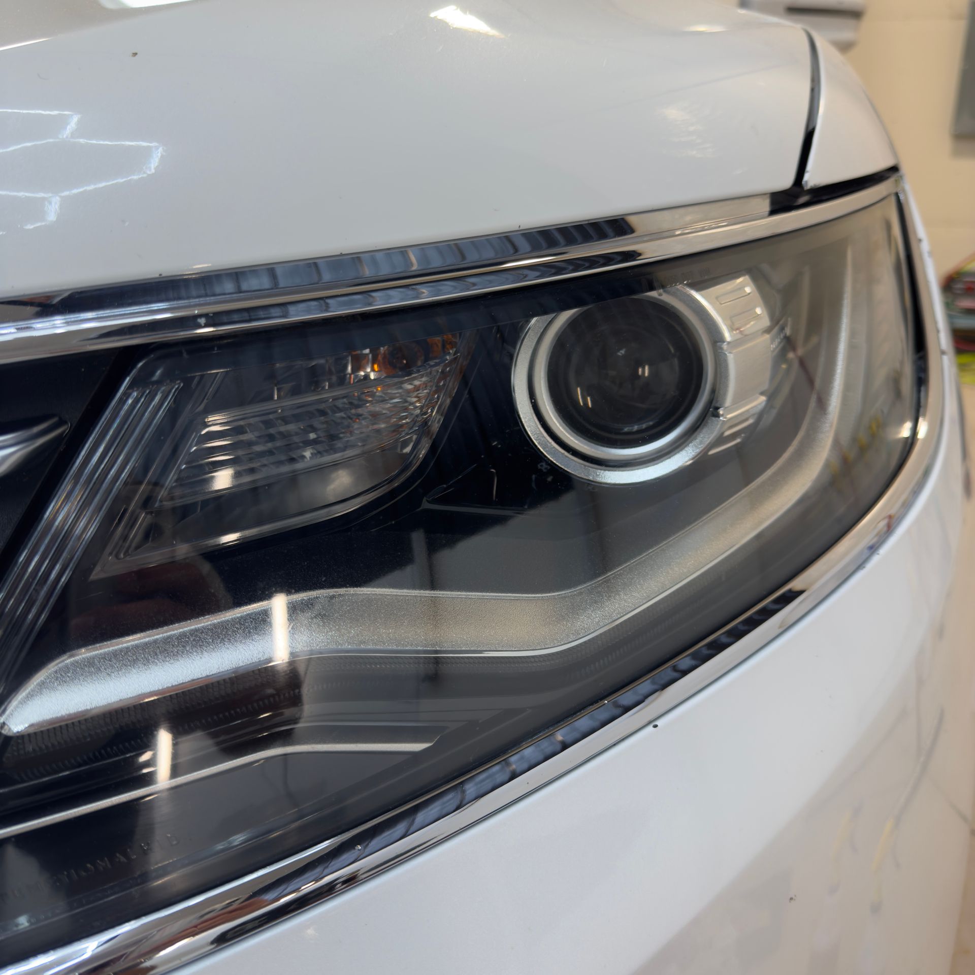 The engine of a car with the hood open