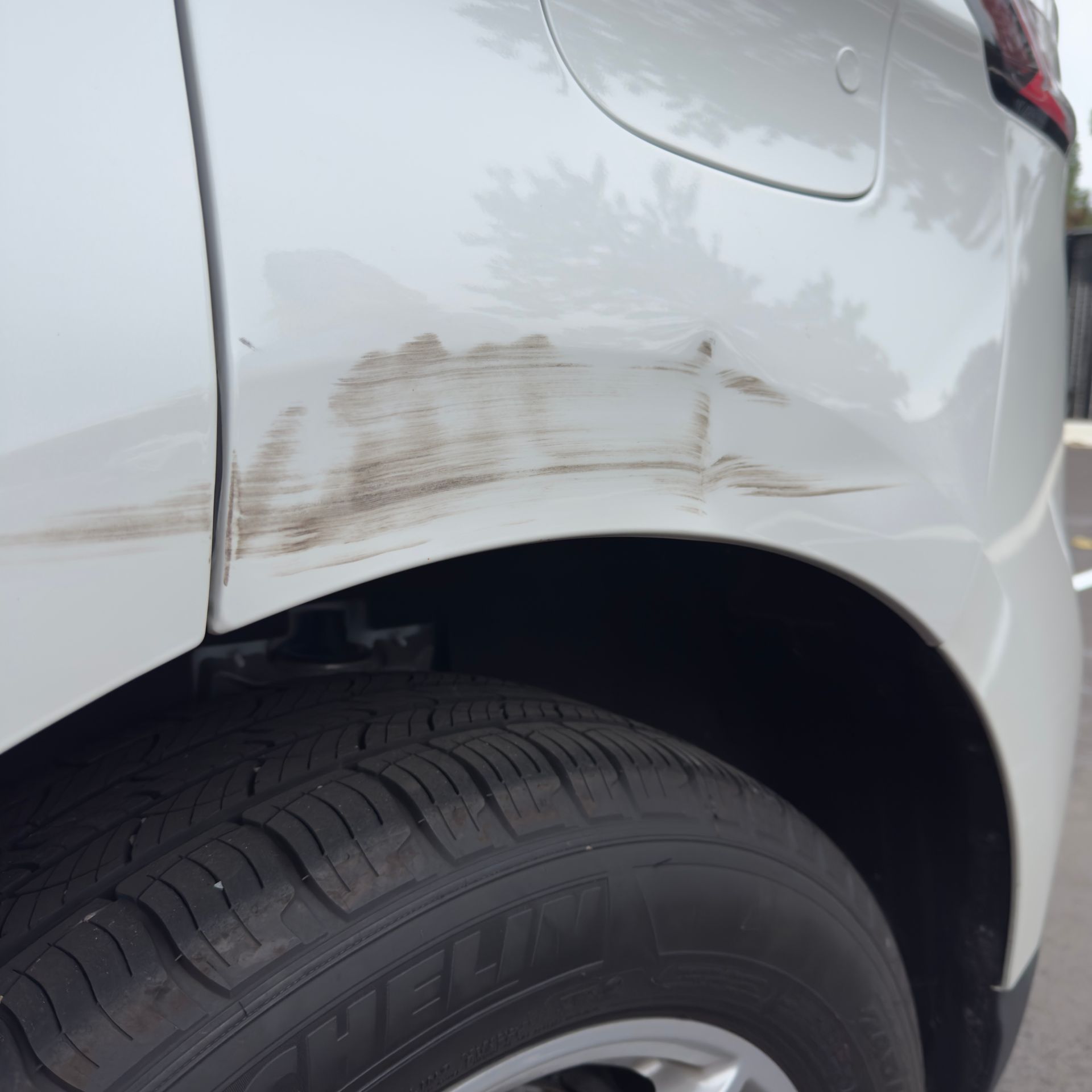 The engine of a car with the hood open