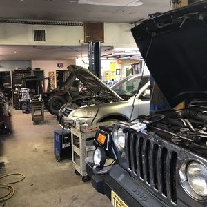 Vehicle Maintenance — Mechanic Repairing Car Transmission in Bedminster, NJ