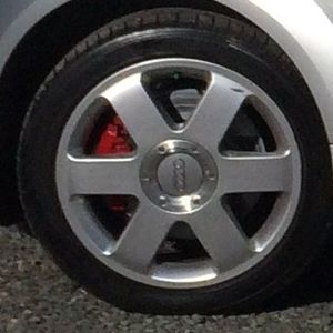Tires — Mechanic Installing Wheels in Bedminster, NJ