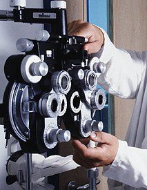 Diabetic Retinal Evaluations - Doctor Setting Up The Equipment For Evaluation In Hamden, CT