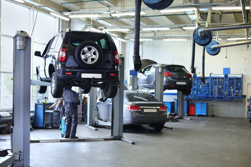 in a garage complete services for range rovers and land rovers