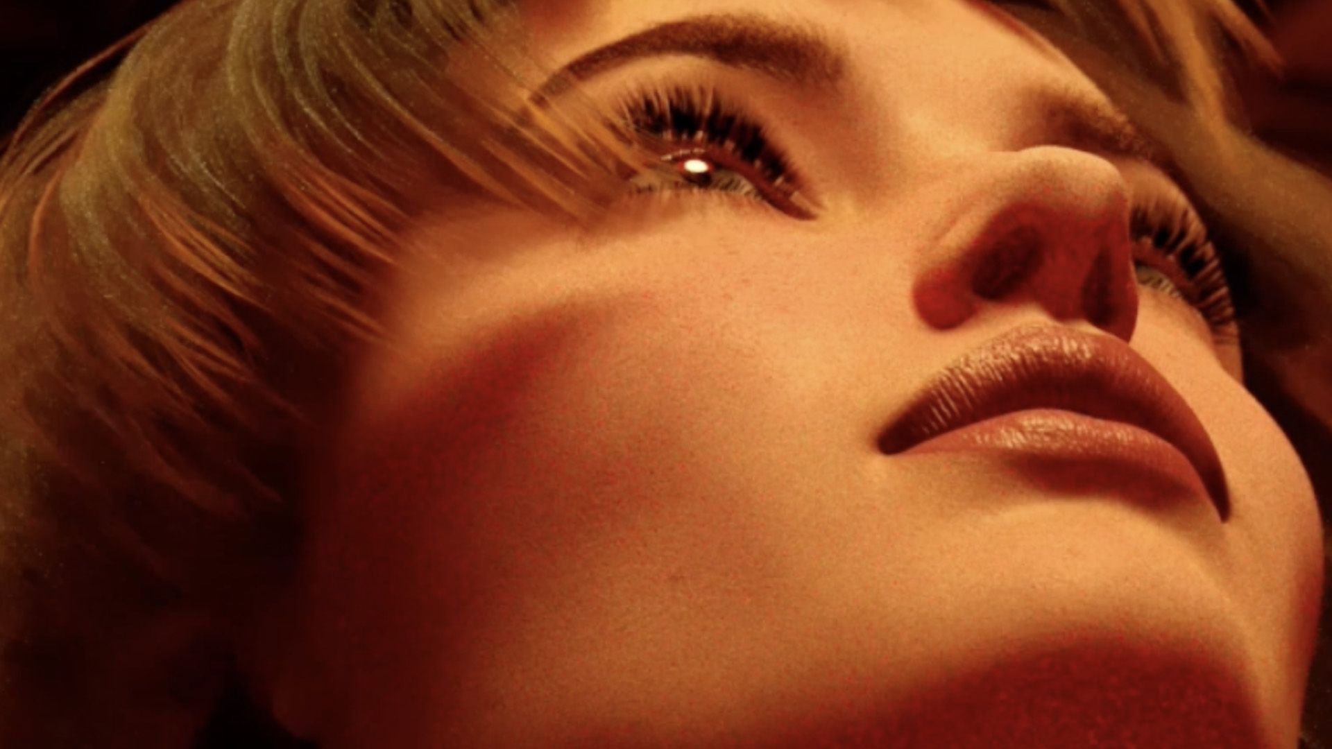 a close up of a woman's face with her eyes focusing on some huge doors that are in front of her. Created by BAILEYCS.