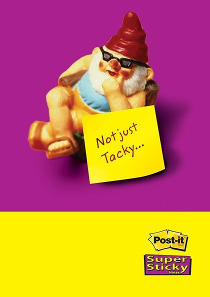 A post it advertisement with a gnome holding a note that says not just tacky