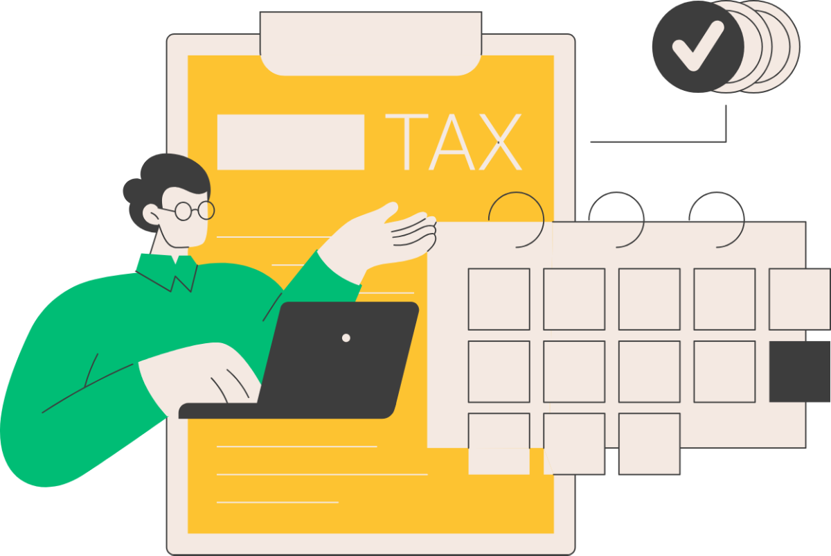 A man is using a laptop next to a clipboard with a tax form on it.