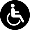 White wheelchair symbol inside a circle.