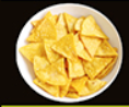 Bowl of golden, triangular tortilla chips.