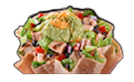 Taco salad in a tortilla bowl, with guacamole, cheese, chicken, lettuce, beans, and vegetables.