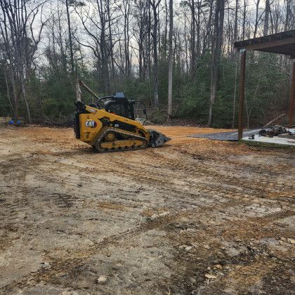 Tractor Grading the Land