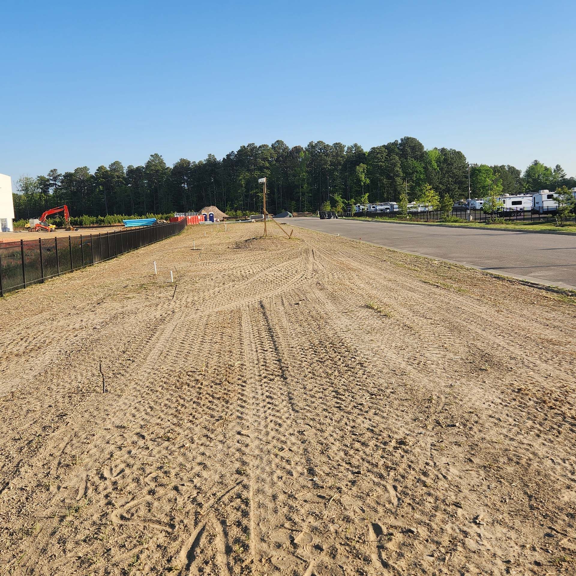A dirt road with a lot of tire tracks on it