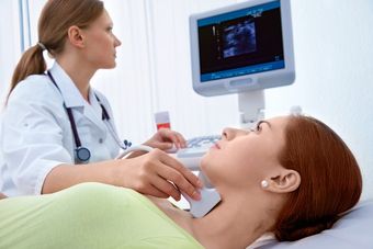doctor scanning for thyroid disorder in fayetteville, nc
