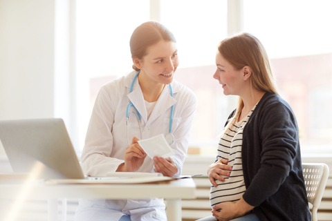 pregnant woman with doctor | women's health in Fayetteville, NC