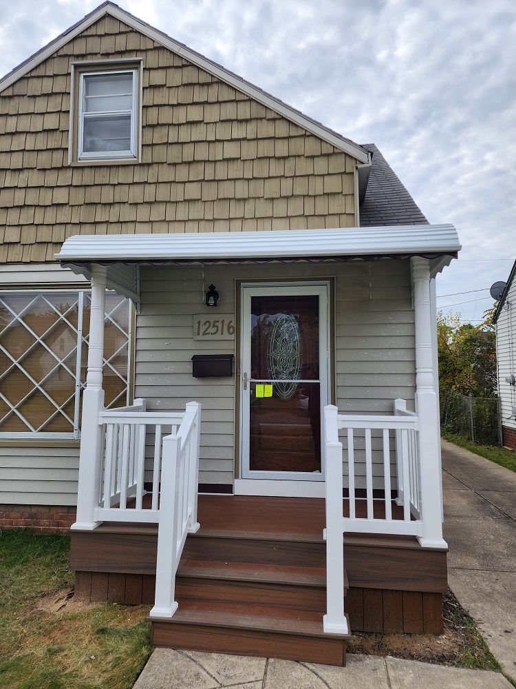 Beautiful House With Glass Door And Step Railings — Cleveland, OH — Ohio Roofing Siding & Slate LLC