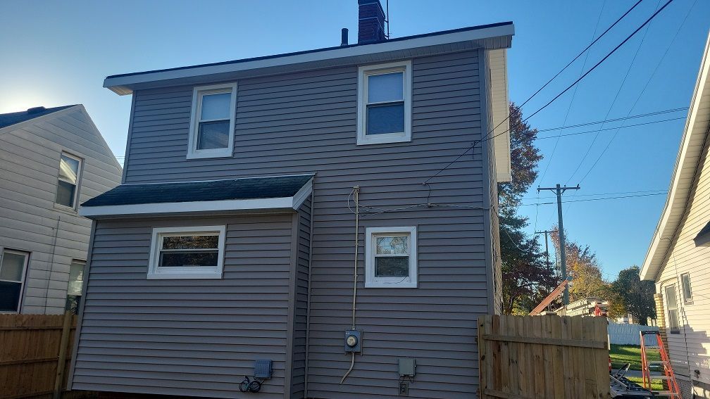 House With Brown Sidings — Cleveland, OH — Ohio Roofing Siding & Slate LLC