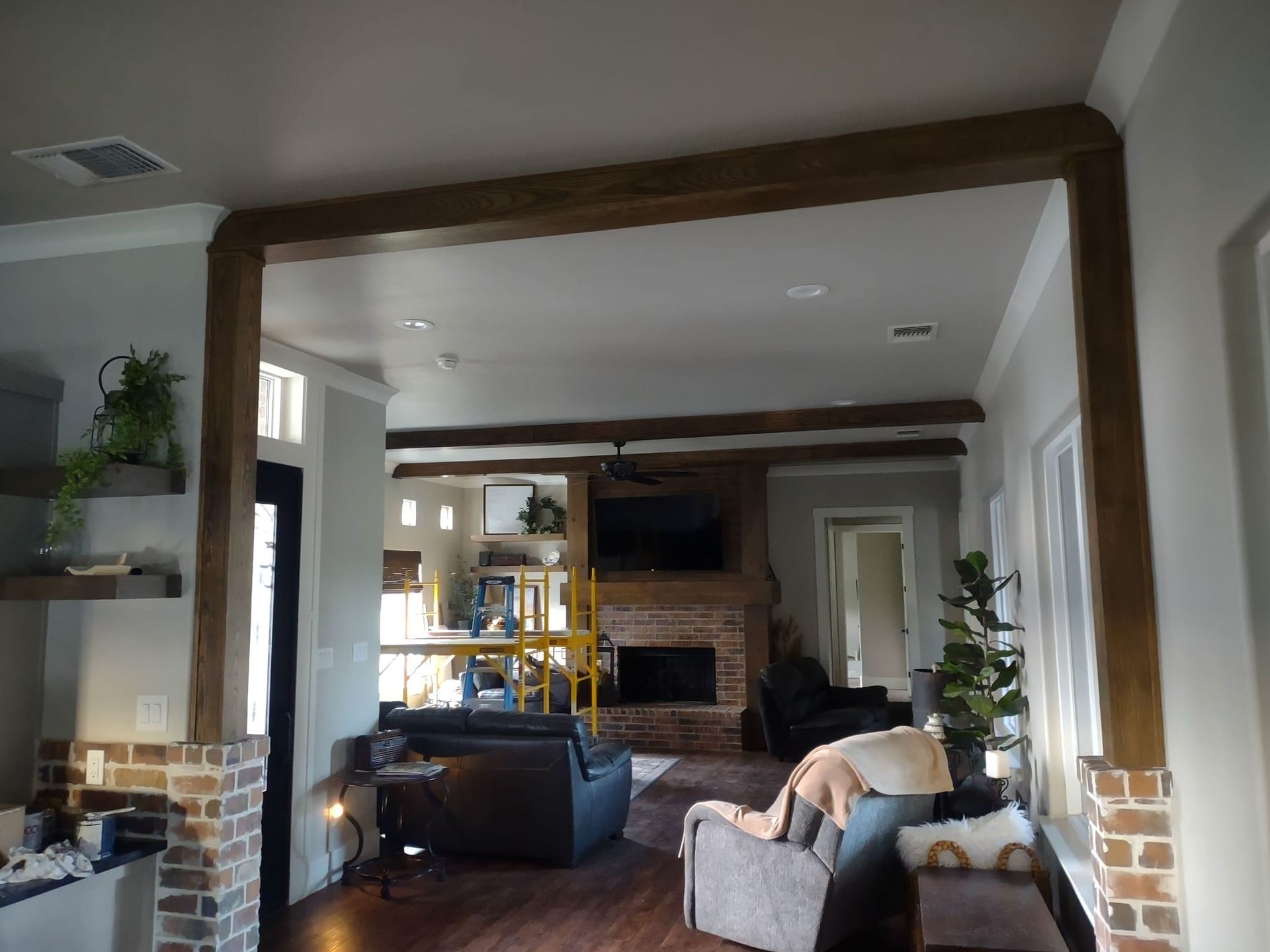 A living room filled with furniture and a fireplace