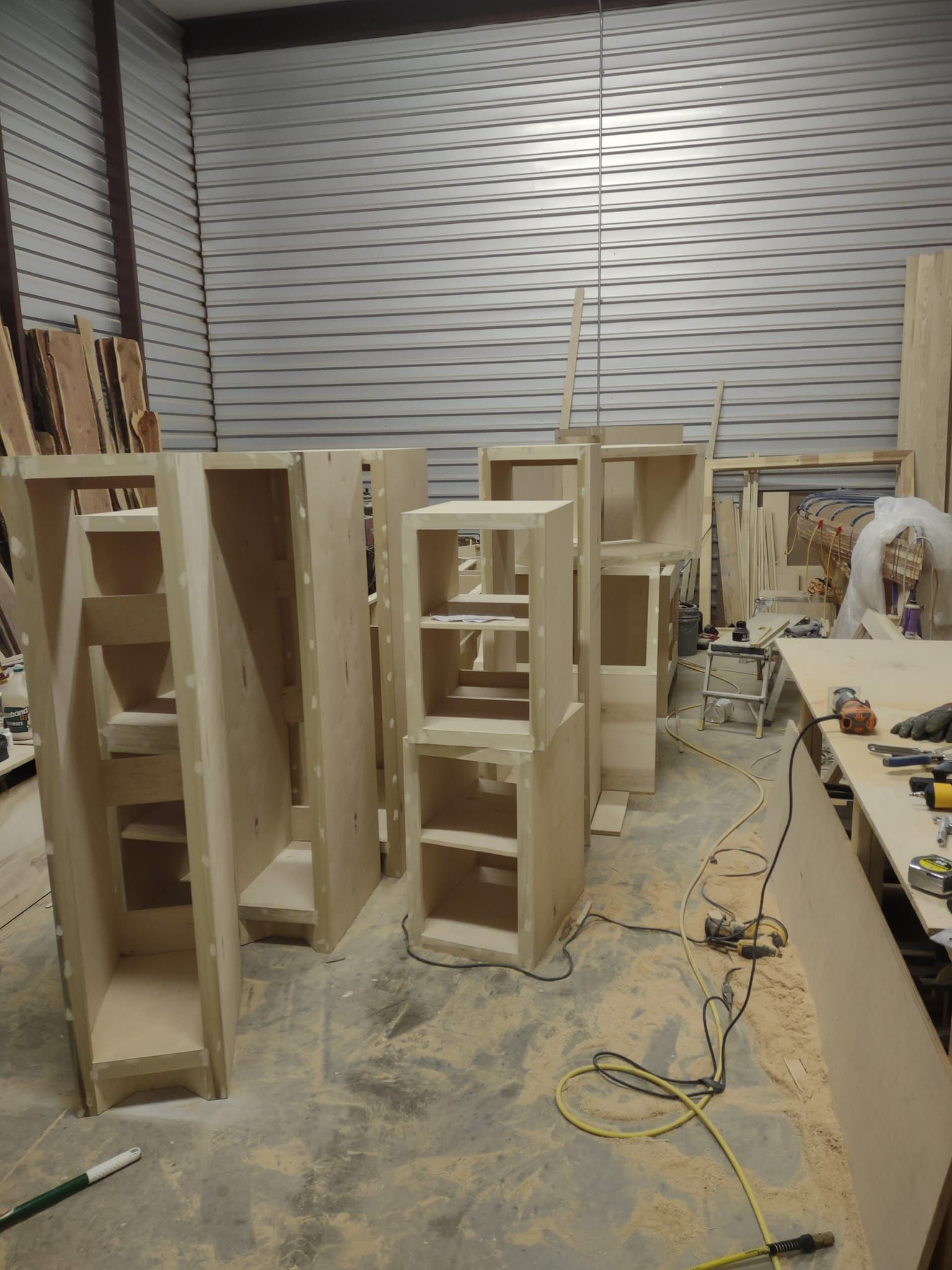 A room filled with lots of wooden boxes and shelves