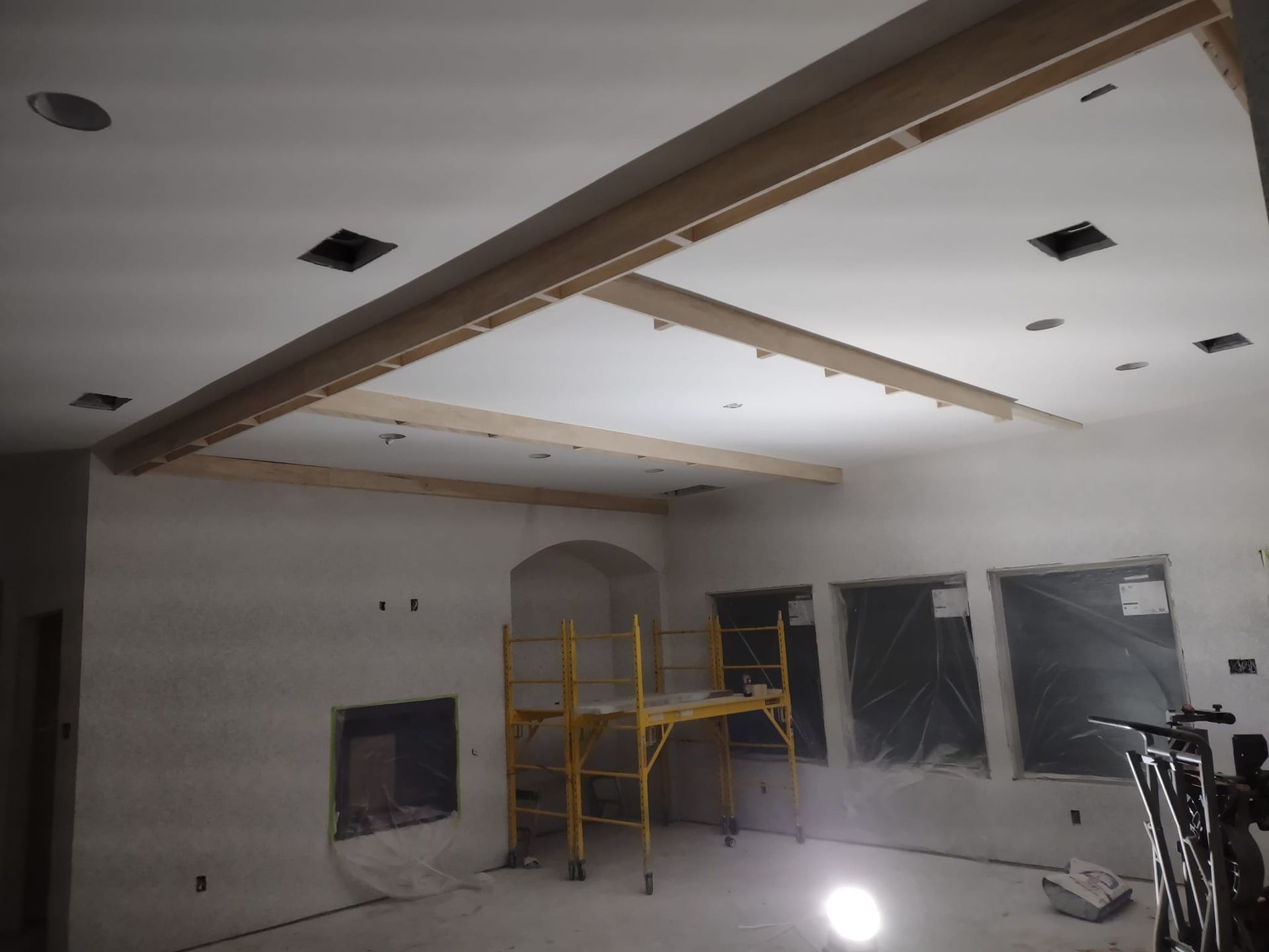 A room with a scaffolding in the middle of it