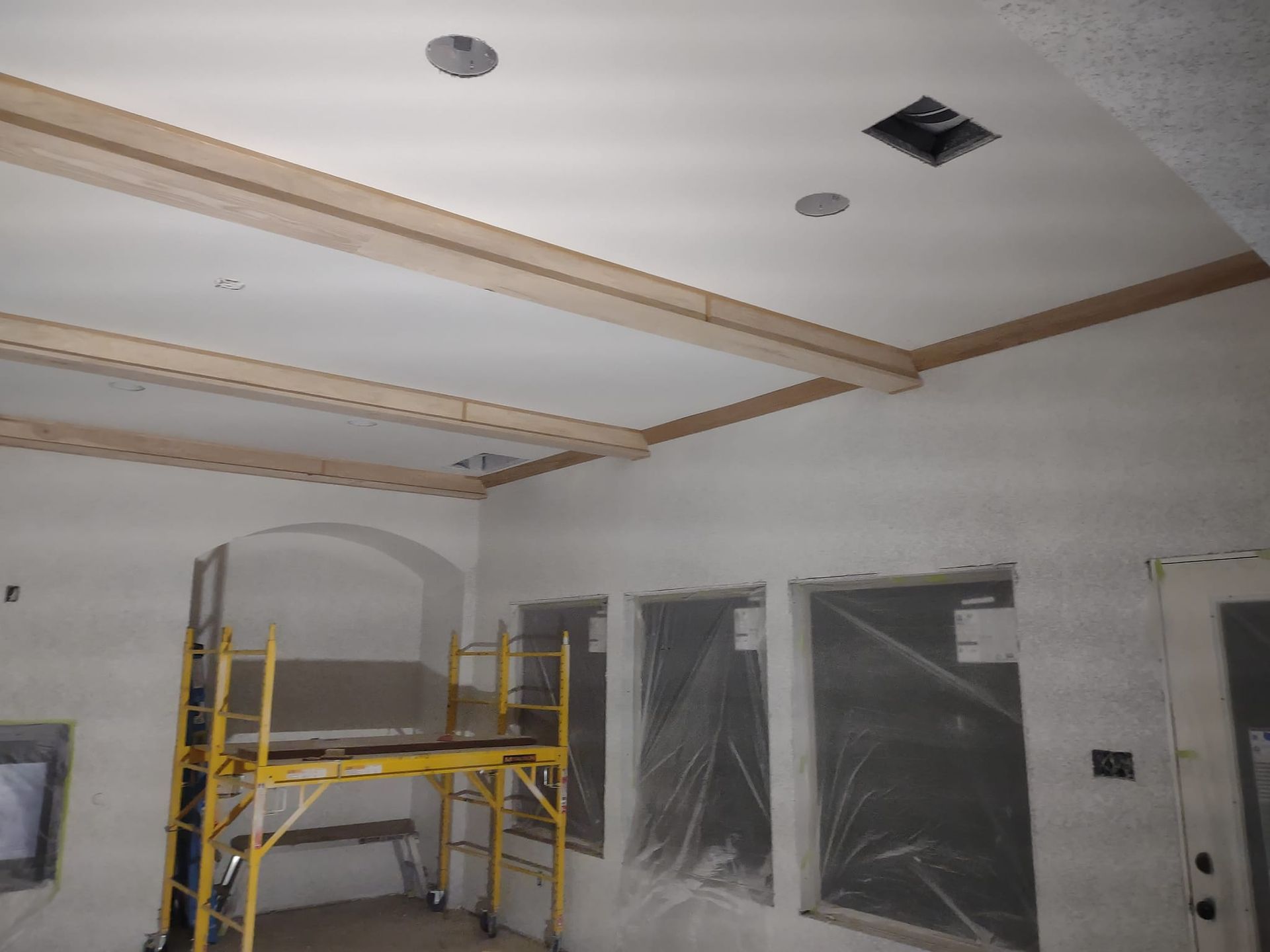 A room with a scaffolding in the middle of it