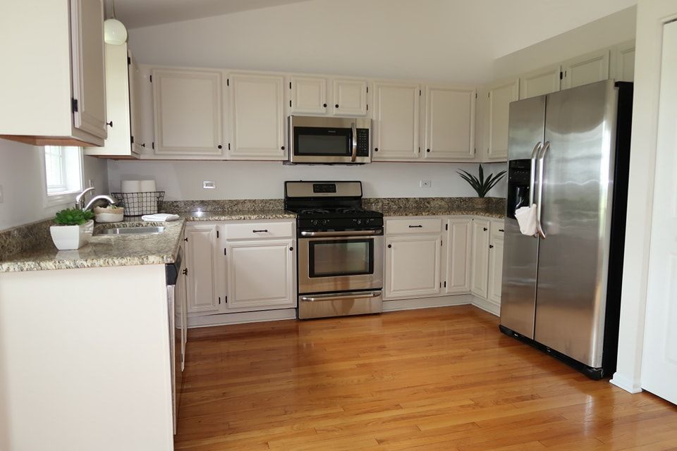 newly painted white cabinets in kitchen