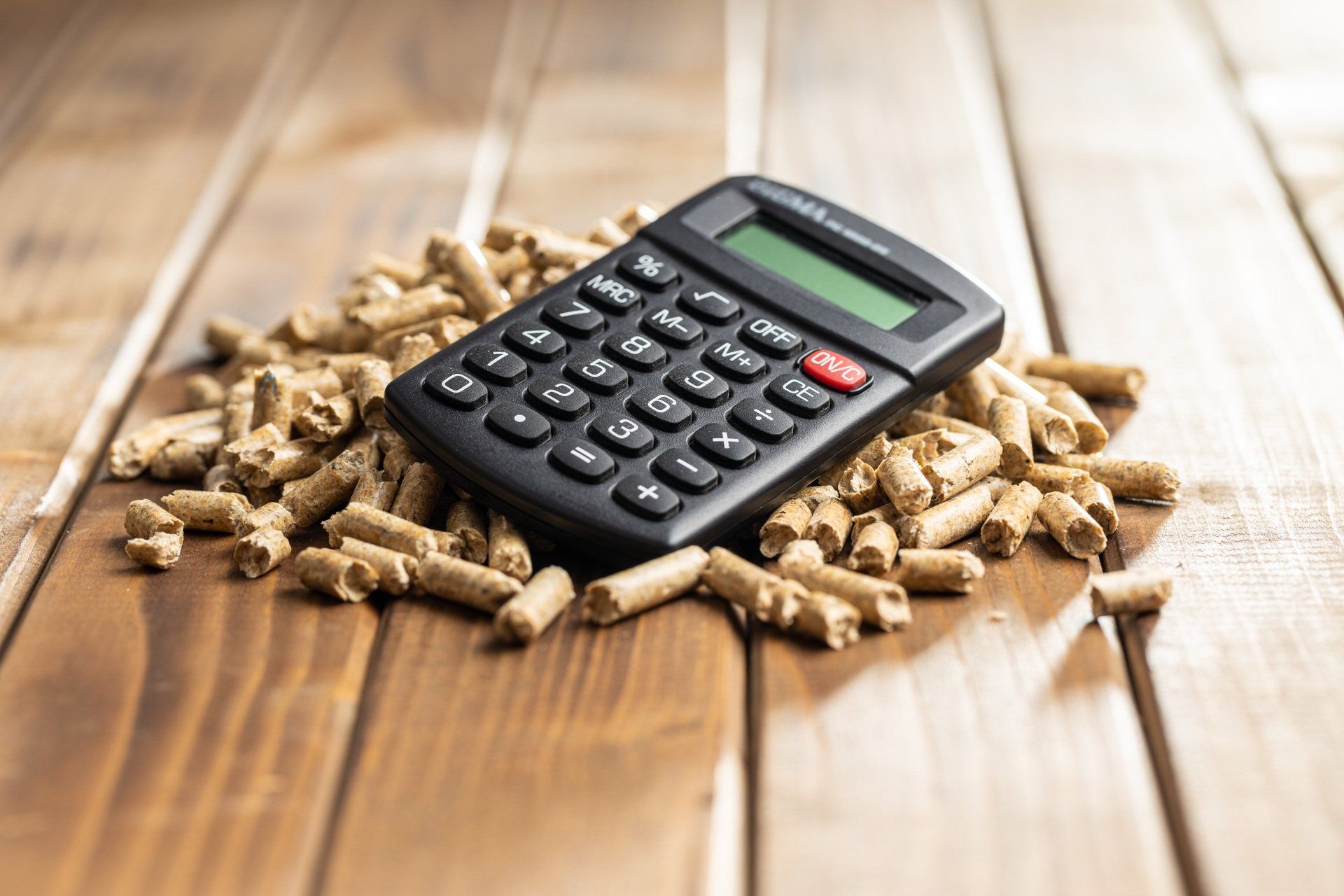 calculator sitting on a pile of ppellets