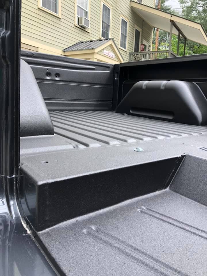 Spray-on bedliner applied to a vehicle