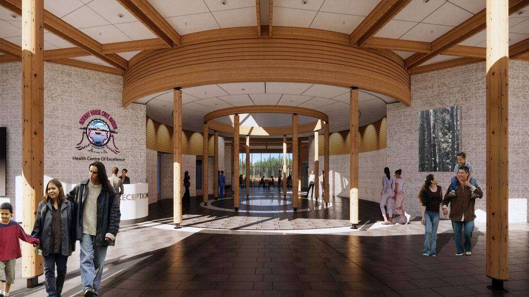 A group of people are walking down a hallway in a building.