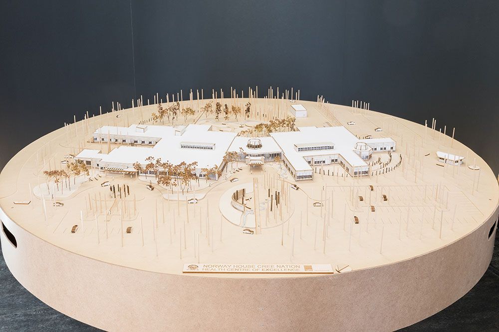 A model of a building on a round table