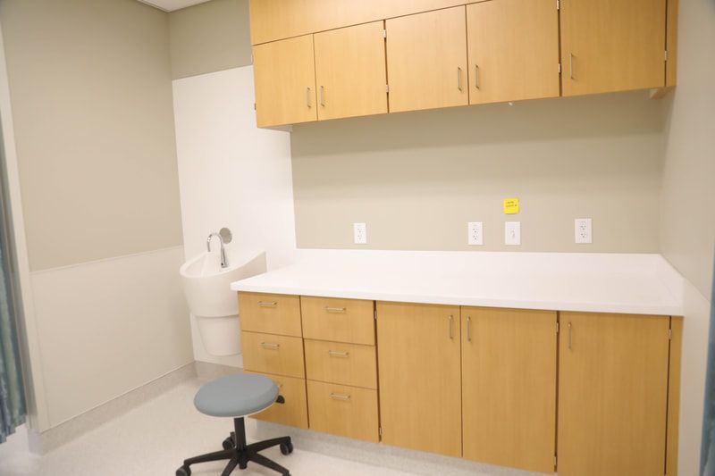 There is a stool in the middle of the room.