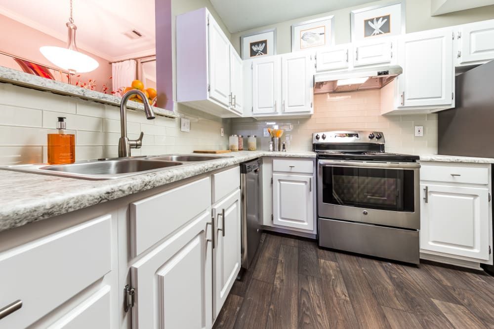 Modern Kitchen with Stainless Steel Appliances at The Marq at Brookhaven